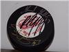 red wings puck in person on Sportscollectors.Net