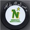 Modano puck on Sportscollectors.Net
